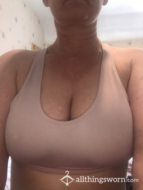 Old  Orange Sports Bra Which Has Seen Lots Of Gym Wear