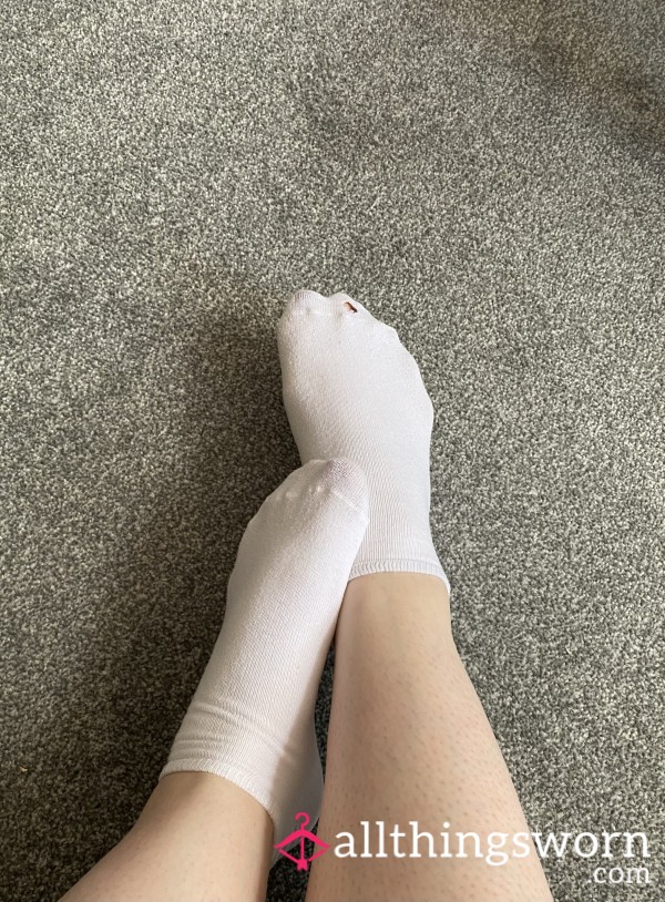 Old White Sock With A Hole