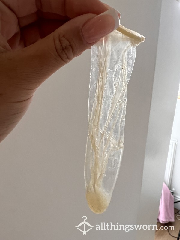 Two Filled Condoms After A Messy Session With Alpha