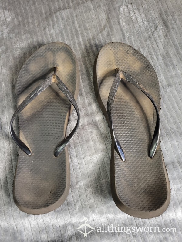 Very Well Worn Black Flip Flops