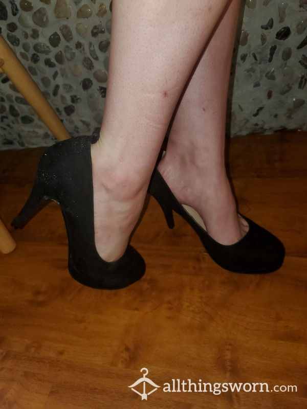 Very Worn Black High Heels.