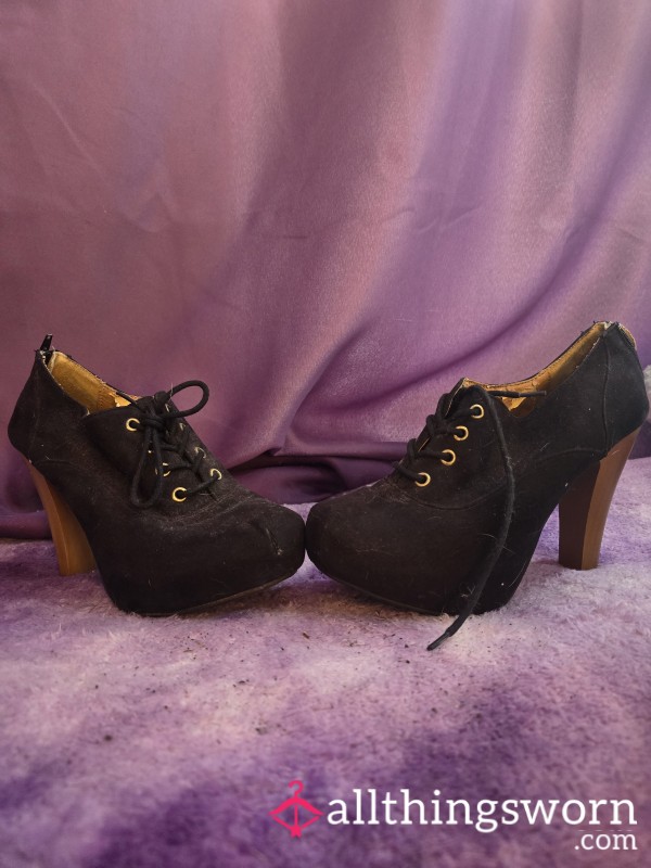 Well-worn Black And Tan High Heel Ankle Boots