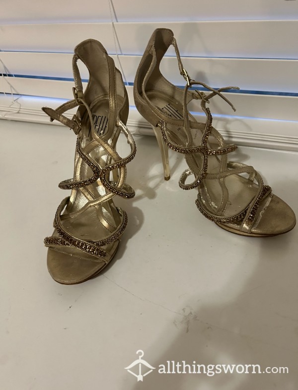 Well Worn Gold Heels