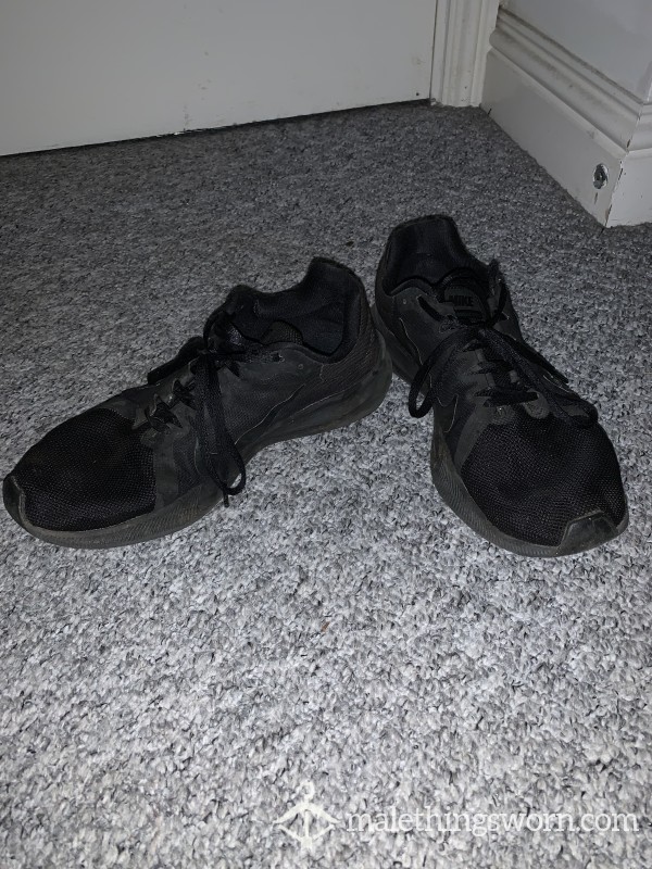 Well Worn Nike Trainers