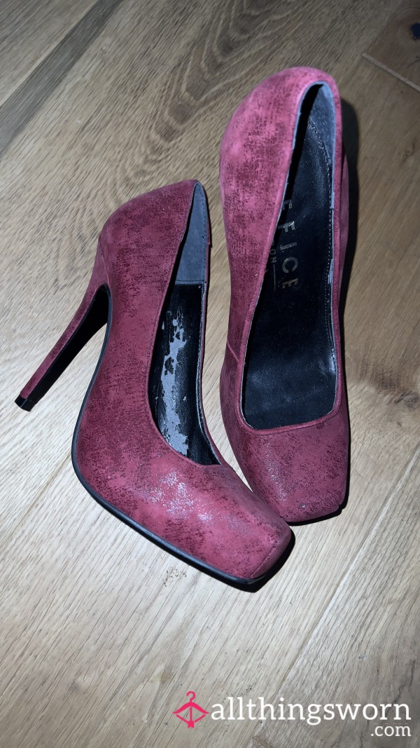 Well-Worn Red High Heel Stained Work Shoes