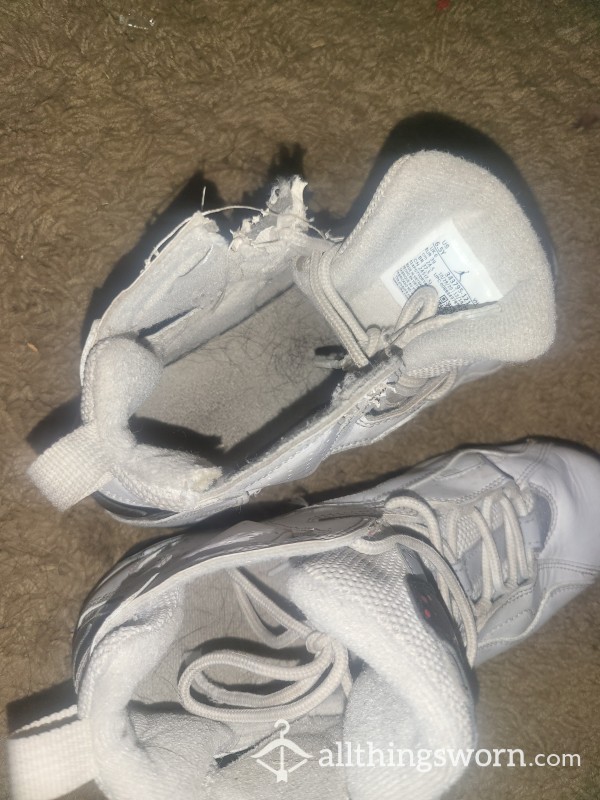 Well-worn White Jordans