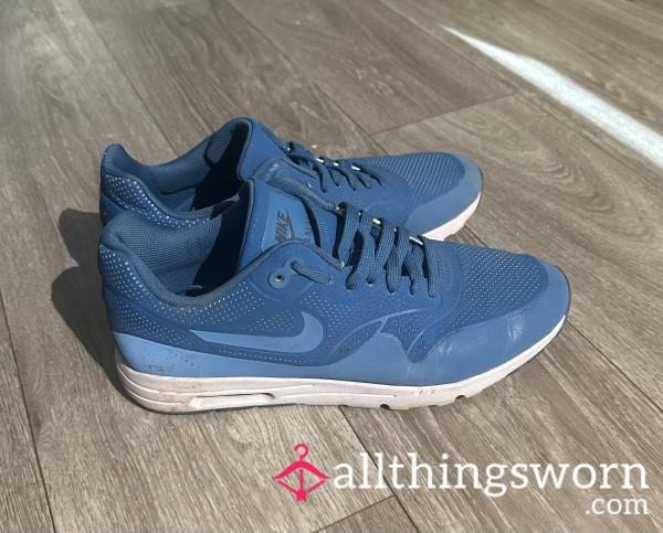 Worn Electric Blue Nike Sneakers