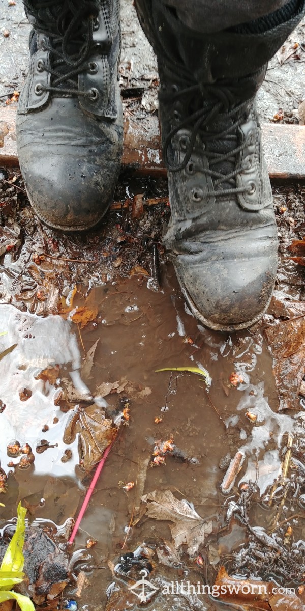 Worn Out Combats Playing In Mud