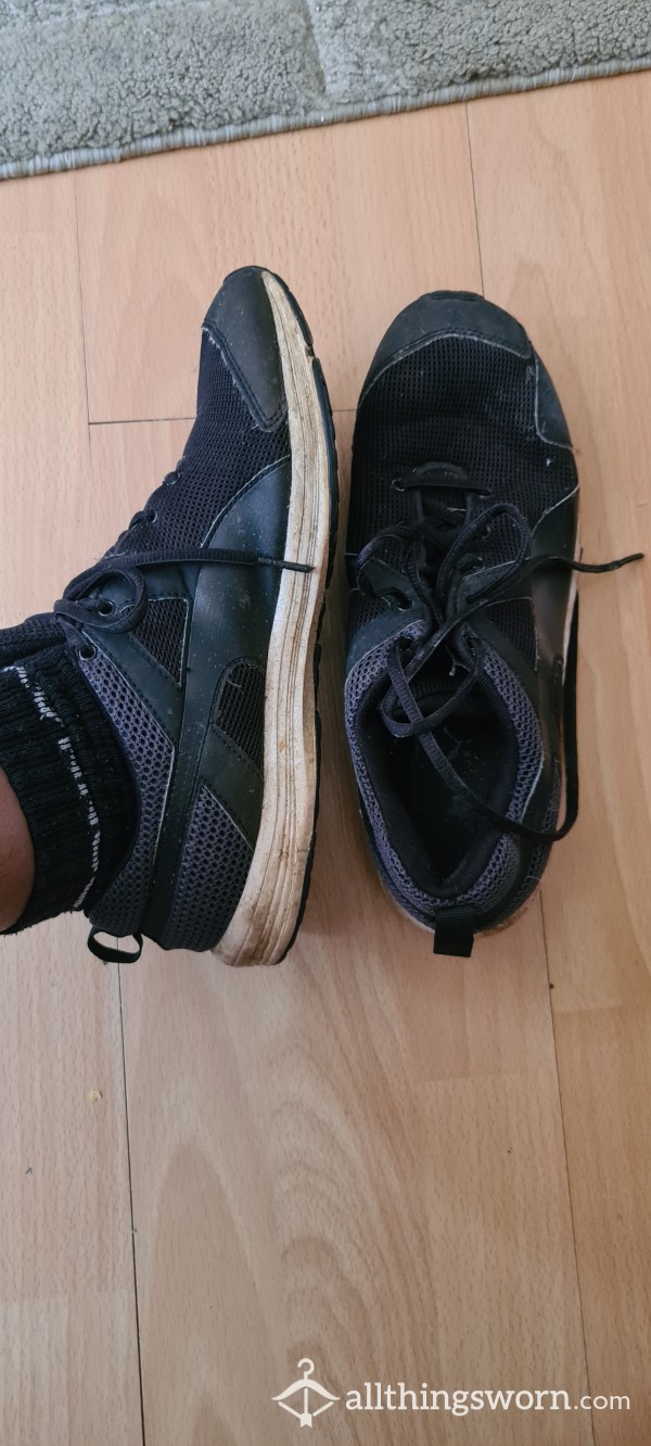 Worn Puma Trainers